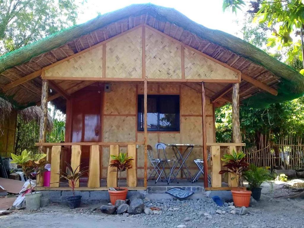 Traditional Filipino Transient House And Huts Near 100 Islands Wharf อลามินอส ภายนอก รูปภาพ